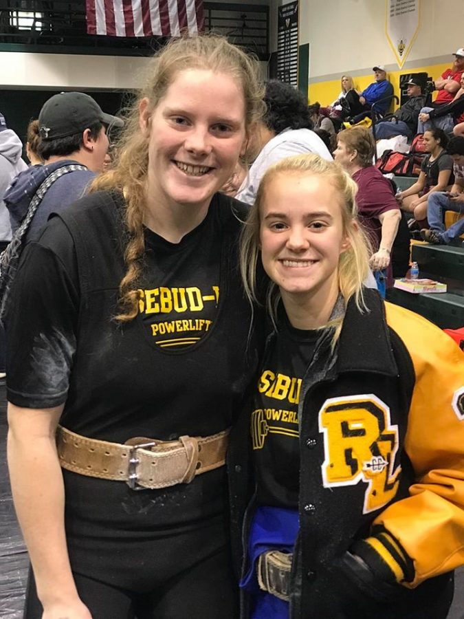 Clara Coker and Lily Dawson pose for a photo after competing in the Regional Powerlifting meet in Academy last weekend. 