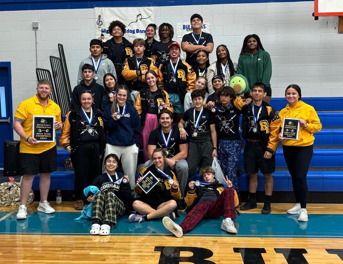 The Powerlifting team poses with their medals and plaques after a successful meet in Bosqueville. 