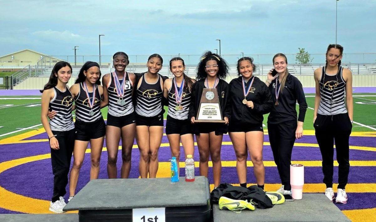 Lady Cougar track members pose for a group photo after earning their spot in the regional meet on May 1-2 in Kingsville. 