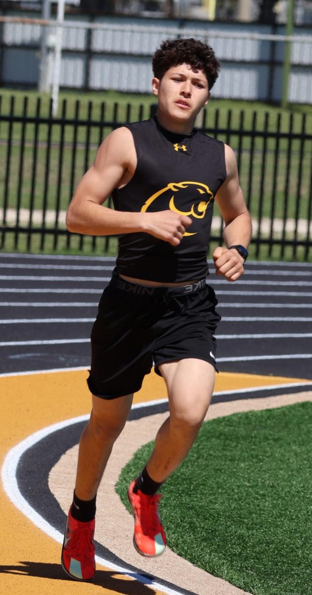 Aiden Dominguez Cruz runs the 800m run at the RL track meet. 